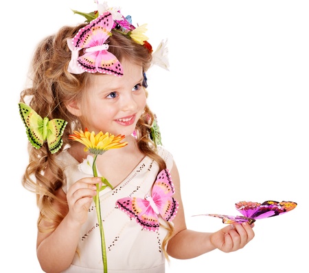 Little girl in spring hairstyle and butterfly. Isolated.の写真素材
