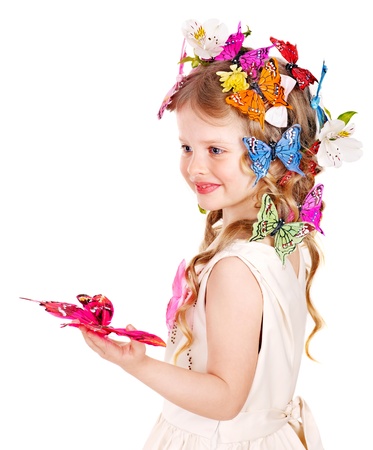 Little girl in spring hairstyle and butterfly. Isolated.の写真素材