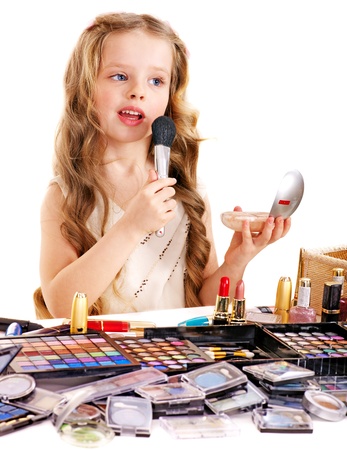 Little girl with child cosmetics.の写真素材