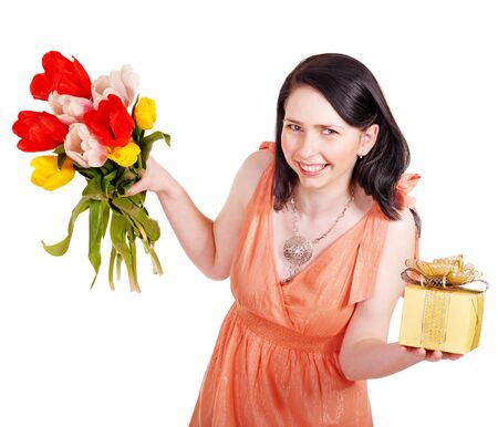 Girl with spring flower and gift box. Isolated.の写真素材