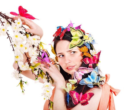 Girl in spring hairstyle and makeup holding flower.の写真素材
