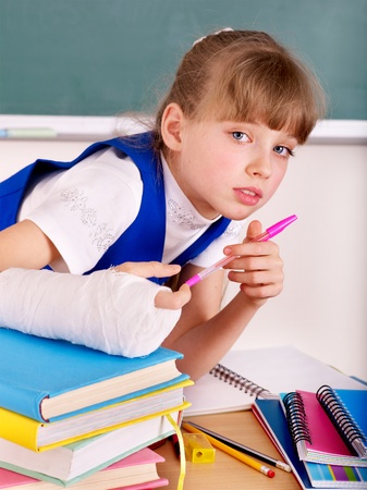 Disabled child with broken armの写真素材