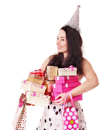 Young woman holding gift box at birthday party.の写真素材