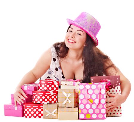 Young woman holding gift box at birthday party.の写真素材
