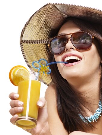 Girl in bikini drink juice through straw. Isolated.の写真素材