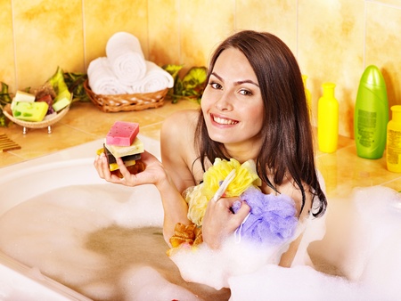 Young woman take bubble  bath.の写真素材
