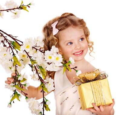 Little girl with spring flower . Isolated.の写真素材