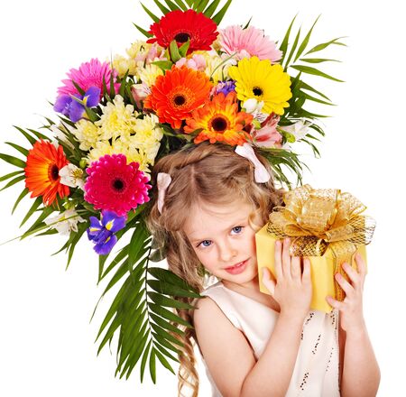 Little girl with spring flower and gift box. Isolated.の写真素材