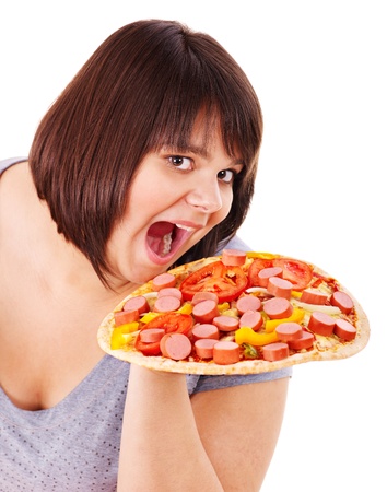 Overweight woman holding hamburger.の写真素材