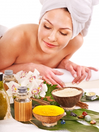 Young woman getting spa treatment . Isolated.の写真素材