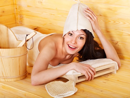 Young woman in sauna.の写真素材