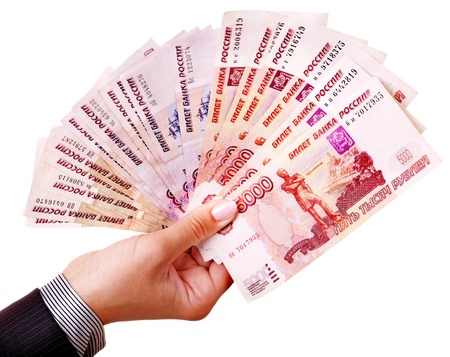 Female hand with  money Russian rouble. Isolated.の写真素材