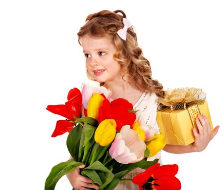 Little girl with spring flower and gift box. Isolated.の写真素材