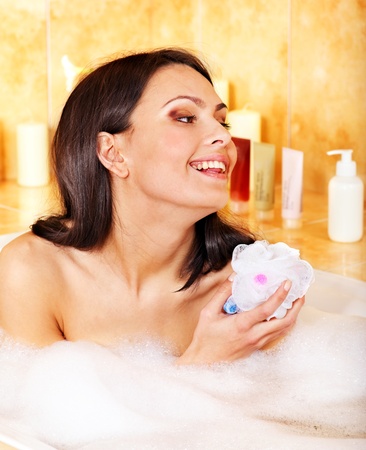 Young woman take bubble  bath.の写真素材
