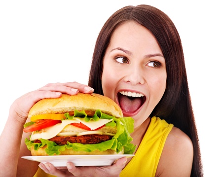 Woman holding hamburger. Isolated.の写真素材