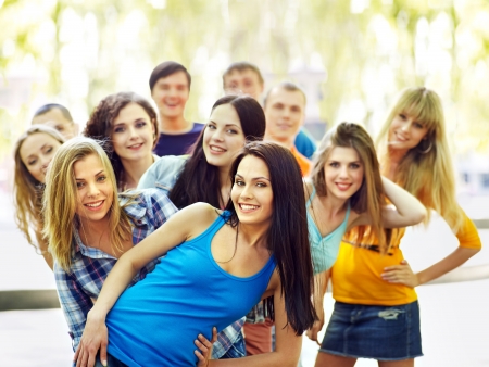 Group happy people in summer outdoor.の写真素材