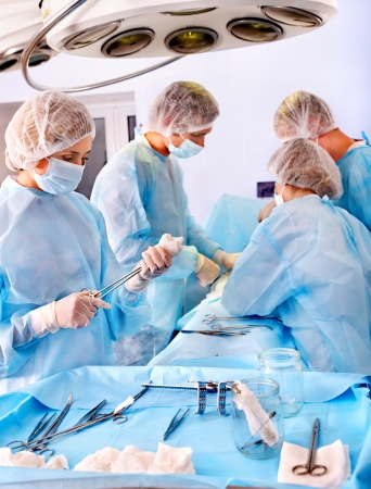 Team surgeon at work in operating room.の写真素材