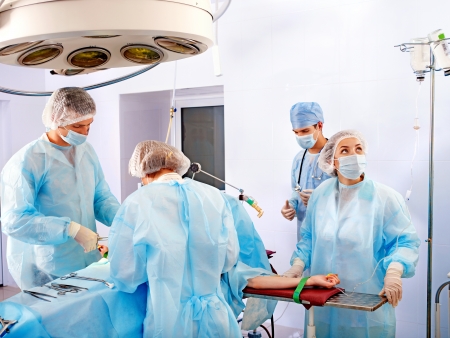 Team surgeon at work in operating room.の写真素材