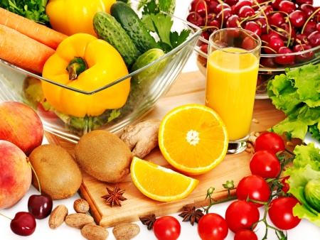 Fresh vegetable and fruit and glass of juice.の写真素材
