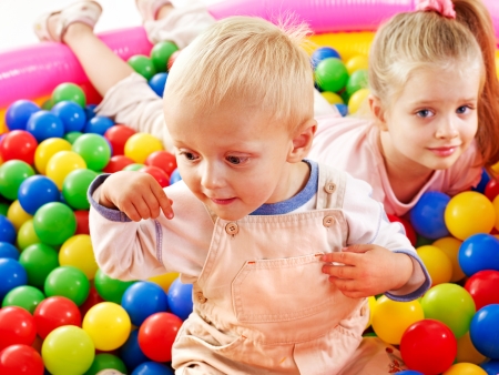 Little boy in colored ball.の写真素材