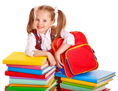 Child with backpack holding book. Isolated.の写真素材