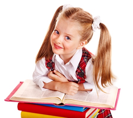 Beautiful child with stack book. Isolated.の写真素材