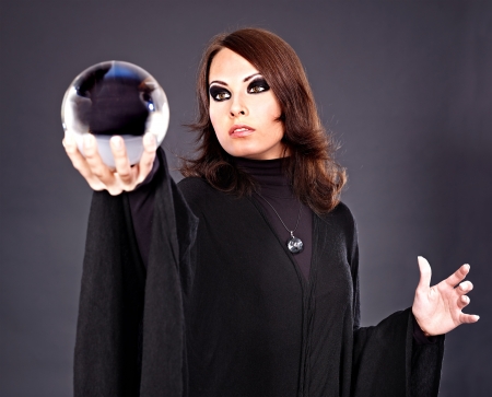 Woman holding crystal ball. Fortune telling.の写真素材