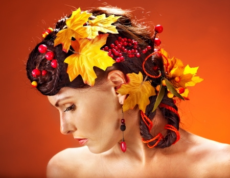 Woman with  autumn hairstyle and make up. Side view.の写真素材