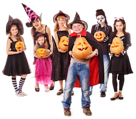 Halloween party with group children holding carving pumpkin.の写真素材