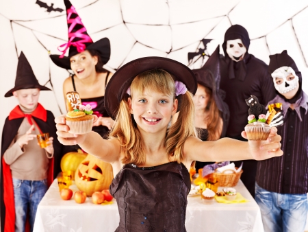 Halloween party with group children holding trick or treat.の写真素材