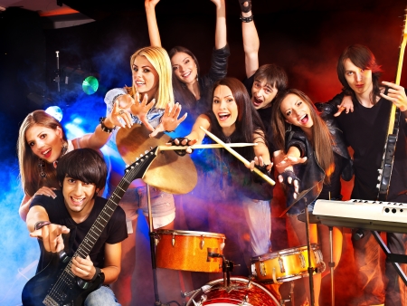 Musical group performance in night club. Lighting effects.の写真素材