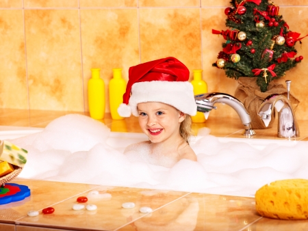 Child washing in bubble bath .の写真素材