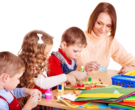 Kindergarden teacher with group children. Isolated .の写真素材