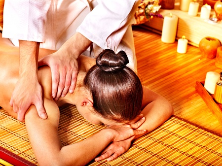 Woman getting  massage in spa.の写真素材