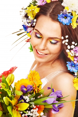 Woman with gift box and flower bouquet . Isolated.の写真素材