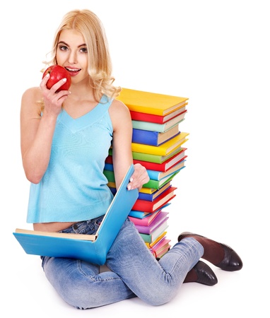 Student with stack book and apple. Isolated.の写真素材