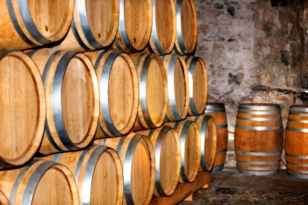 Barrel of wine in old winery.の写真素材