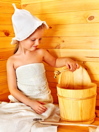 Happy with child relaxing at sauna.の写真素材