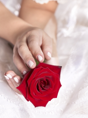 Bride with red rose bouquetの写真素材