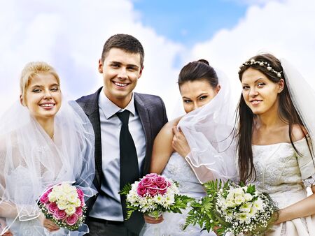 Group bride and groom wedding summer outdoor.の写真素材