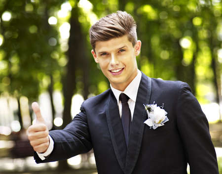 Man groom in park outdoor.の写真素材