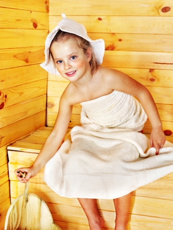 Happy with child relaxing at sauna.の写真素材