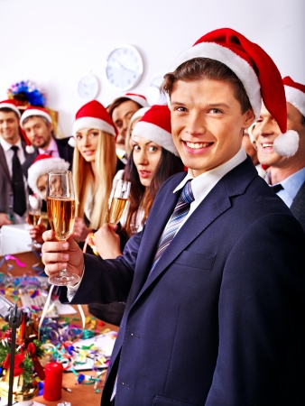 Happy business group people in santa hat at Xmas party.の写真素材