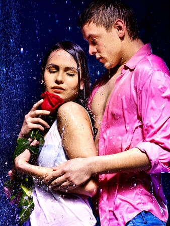 Beauty couple with rose flower.の写真素材