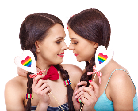 Two lesbian women with heard  in erotic foreplay game.の写真素材