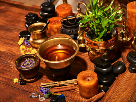 Luxury ayurvedic spa massage still life. Oil and stone.の写真素材