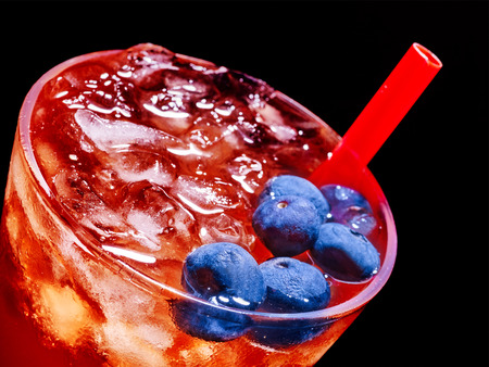 Cold red blueberry drink  with blue berry . Top view.の写真素材