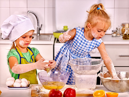 Alone messy kids learn preparing breakfast at home kitchenの写真素材