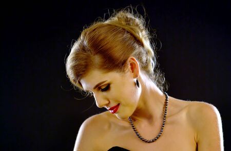 Nude shoulders woman. Naked back girl. Portrait in profile. Backlight illuminates feminine Jewelry...