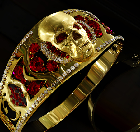 Jewelry gold skull ring with diamond and red gems. Antiques pirate treasure or hoard may be magic vampire artifact. Closeup and turned sideways. Luxury bijouterie for biker with reflection. 3D render.の写真素材